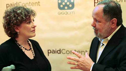 Staci D. Kramer (shown with Larry Kramer, president of USA Today): "It's one thing to have a sponsor ... but it's quite another to write about sponsors or advertisers in exchange for money."