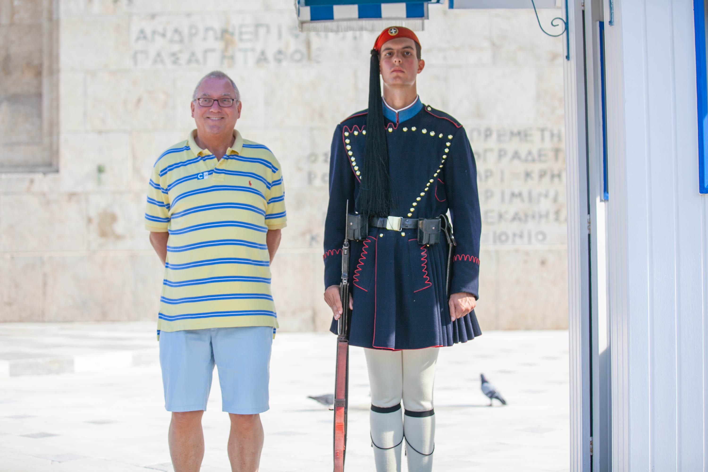 Evzones guard with tourist